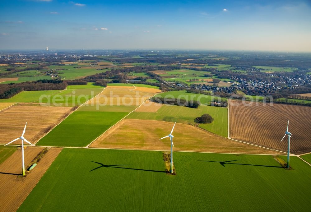 Issum from the bird's eye view: Wind turbine windmills on a field in Issum in the state North Rhine-Westphalia