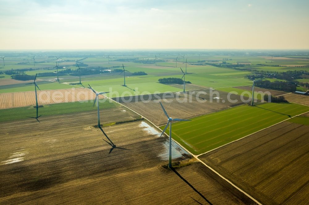 Issum from above - Wind turbine windmills on a field in Issum in the state North Rhine-Westphalia