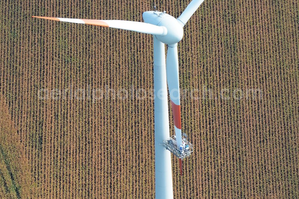 Kutenholz from above - Repair work of a wind turbine windmill on a field in Kutenholz in the state Lower Saxony