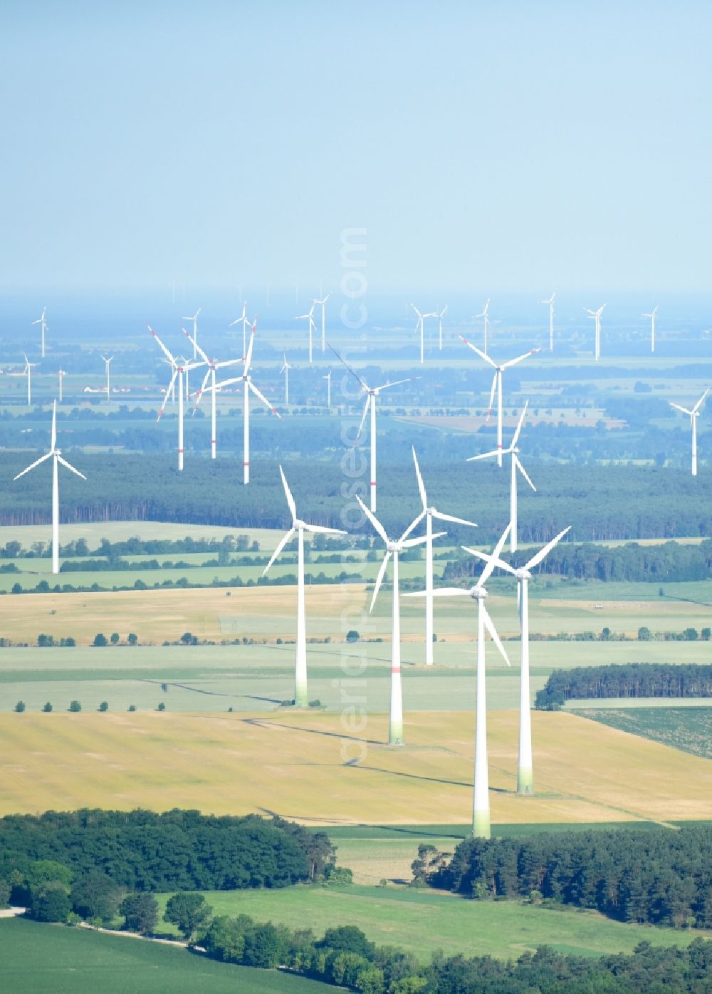 Langengrassau from above - Wind turbine windmills on a field in Langengrassau in the state Brandenburg, Germany