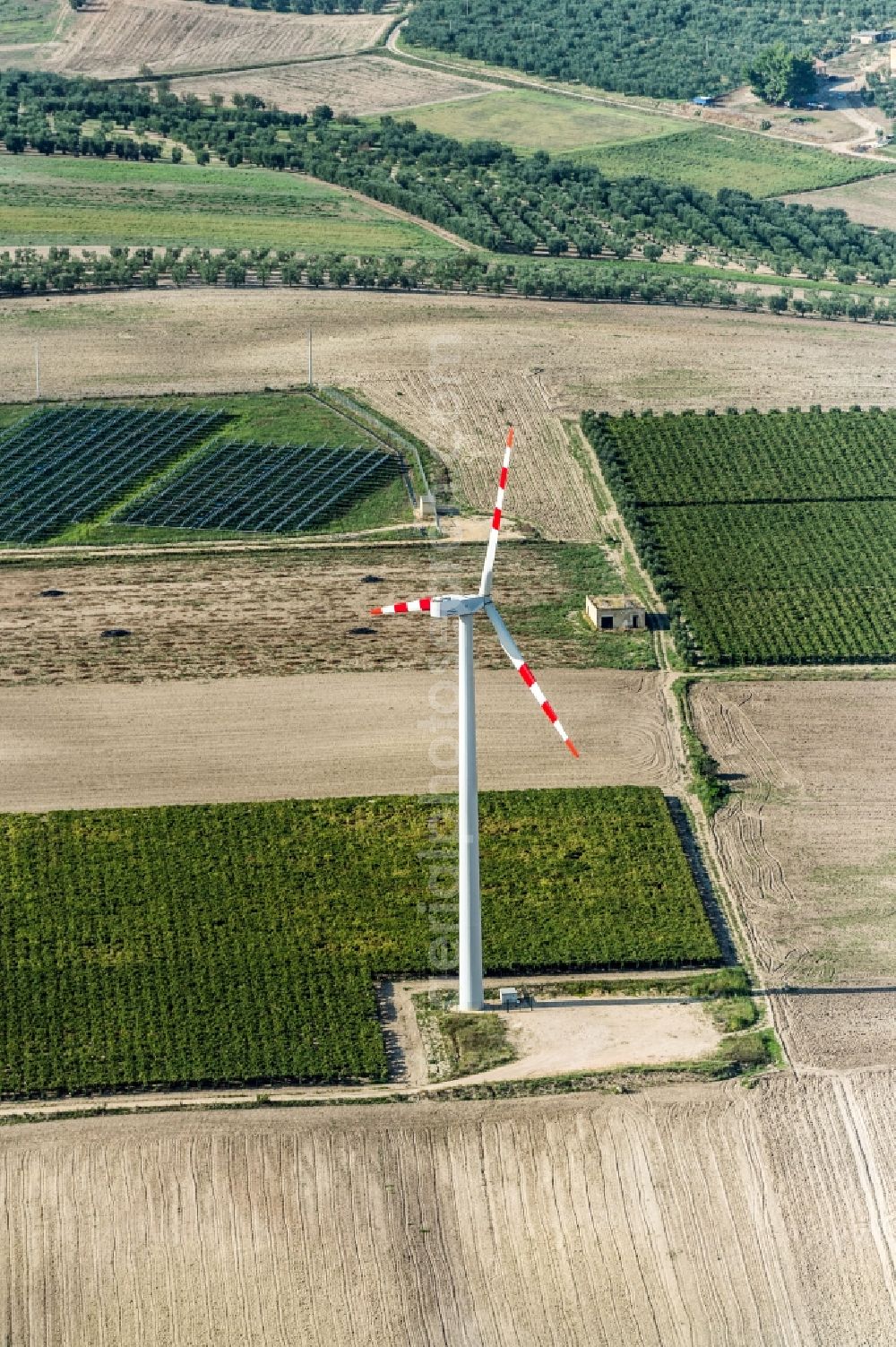 Marken from the bird's eye view: Wind turbine windmills on a field in Marken in Itlien