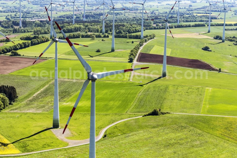 Aerial photograph Mücke - Wind turbine windmills on a field in Muecke in the state Hesse, Germany