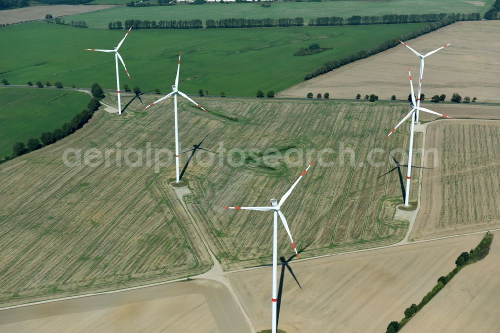 Aerial image Neuburg - Wind turbine windmills on a field in Neuburg in the state Mecklenburg - Western Pomerania