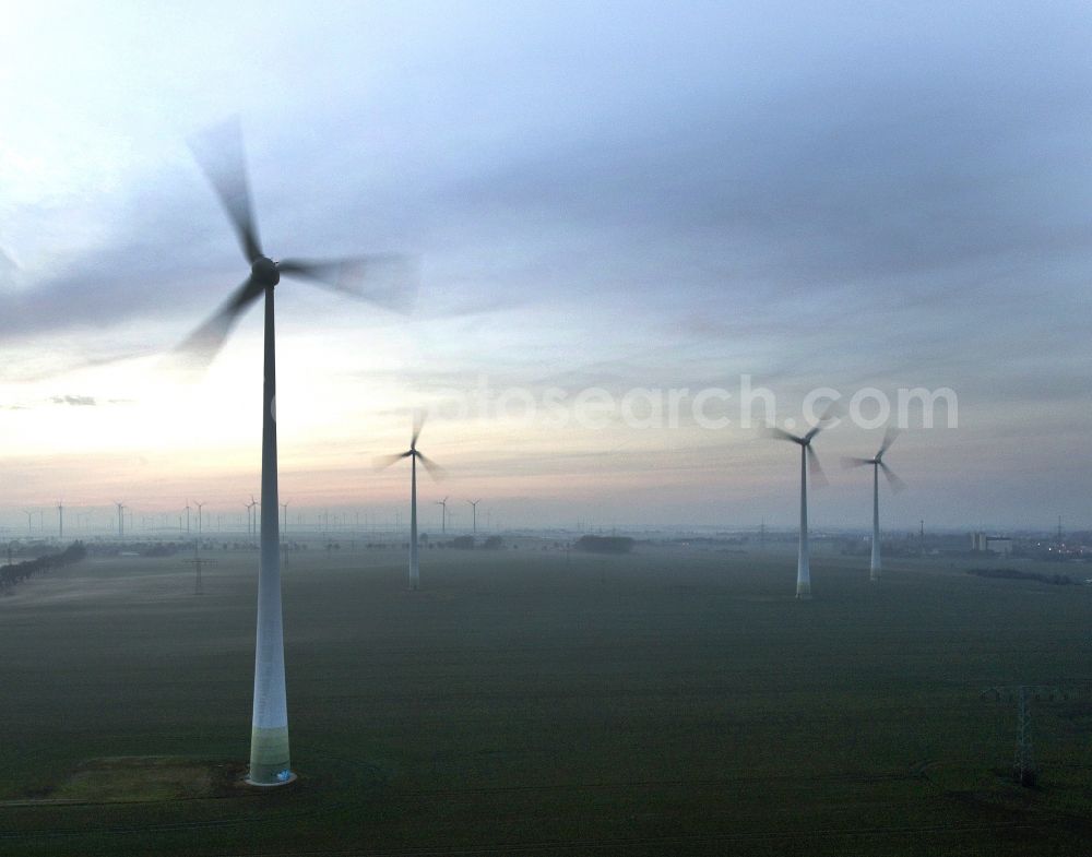 Nauen from above - Wind turbine windmills on a field in the district Neukammer in Nauen in the state Brandenburg, Germany