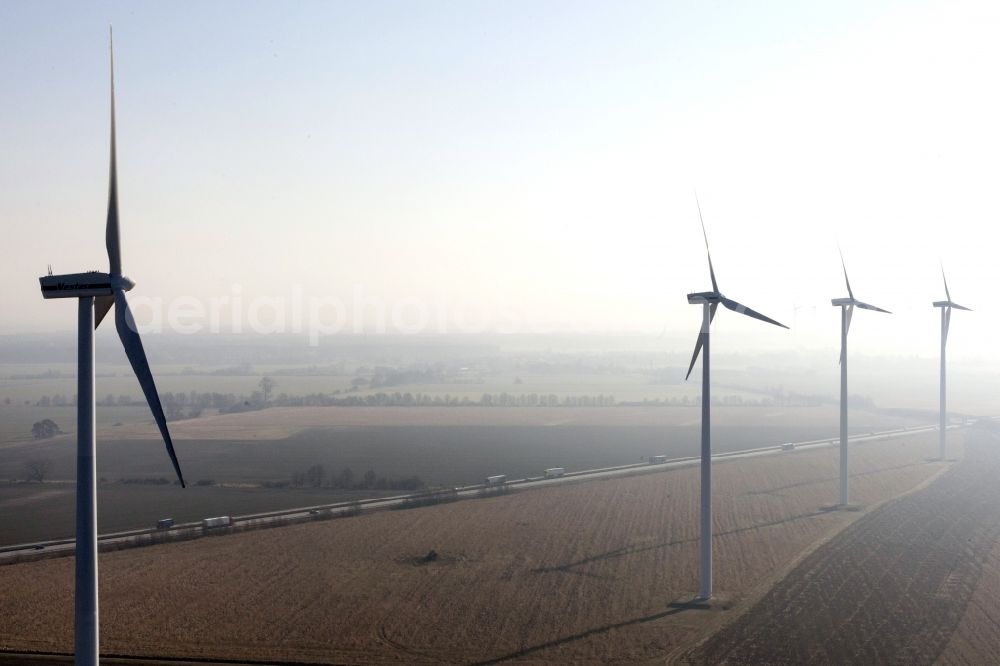 Aerial photograph Nauen - Wind turbine windmills on a field in the district Neukammer in Nauen in the state Brandenburg, Germany