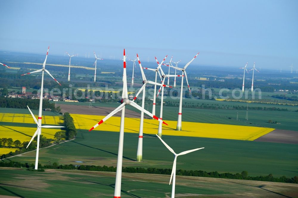 Osterburg (Altmark) from the bird's eye view: Wind turbine windmills on a field in Osterburg (Altmark) in the state Saxony-Anhalt, Germany