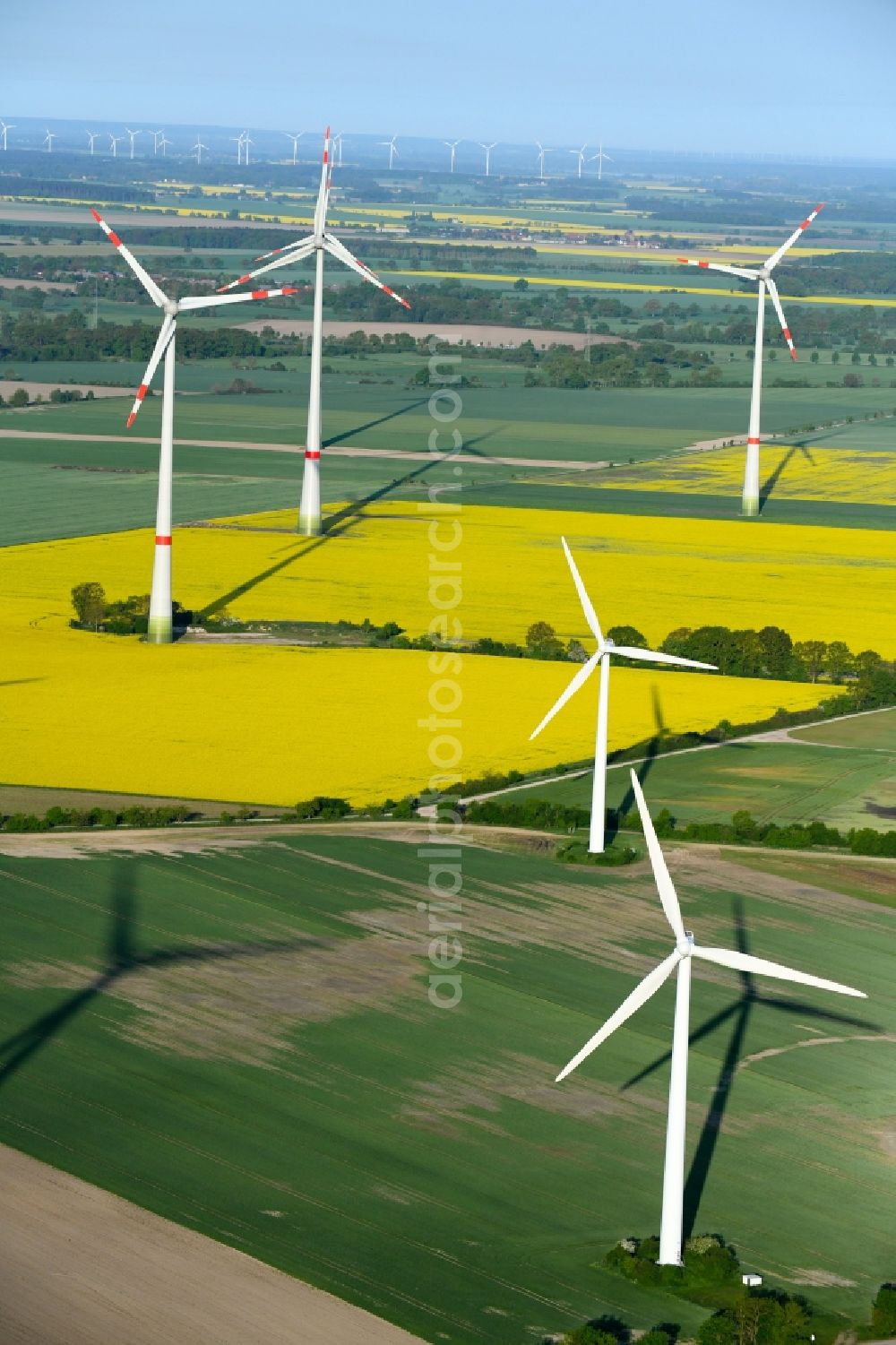 Osterburg (Altmark) from the bird's eye view: Wind turbine windmills on a field in Osterburg (Altmark) in the state Saxony-Anhalt, Germany