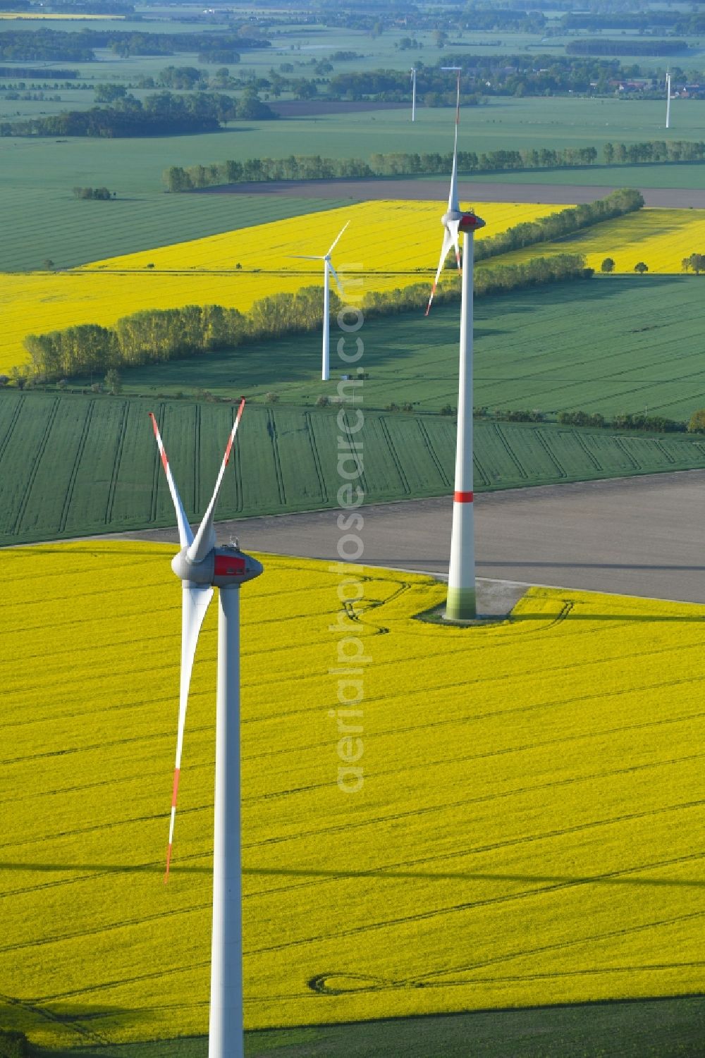 Aerial image Osterburg (Altmark) - Wind turbine windmills on a field in Osterburg (Altmark) in the state Saxony-Anhalt, Germany