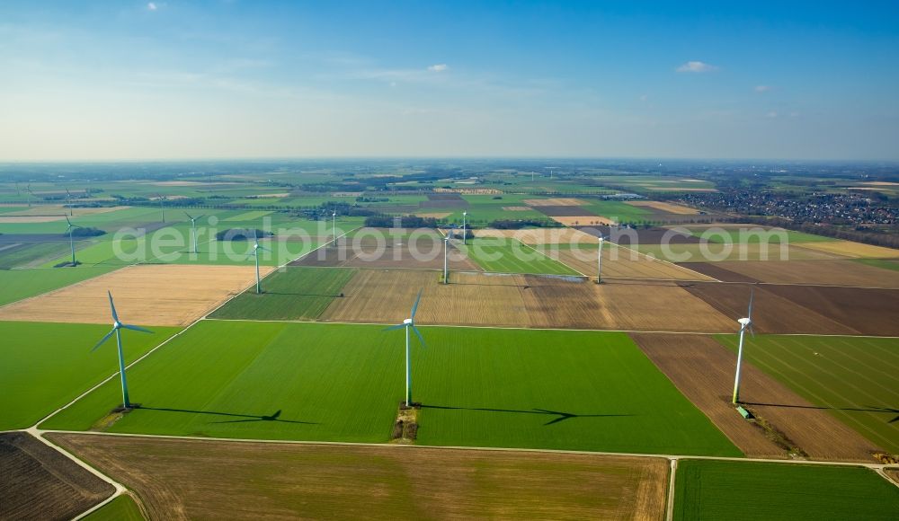 Aerial photograph Rheurdt - Wind turbine windmills on a field in Rheurdt in the state North Rhine-Westphalia