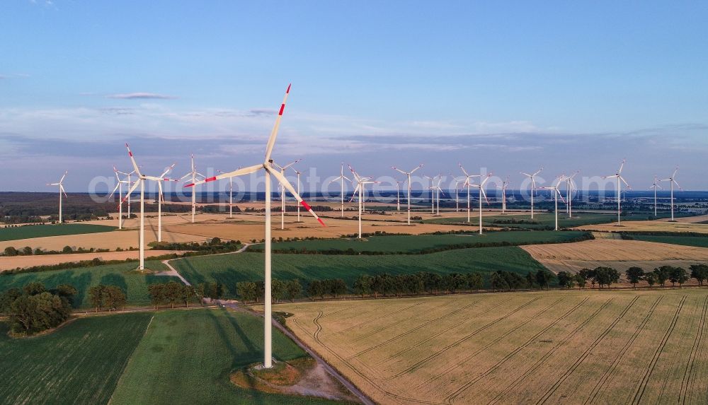 Sieversdorf from the bird's eye view: Wind turbine windmills on a field in Sieversdorf in the state Brandenburg, Germany