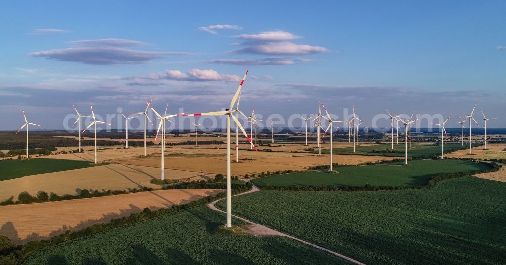 Aerial image Sieversdorf - Wind turbine windmills on a field in Sieversdorf in the state Brandenburg, Germany