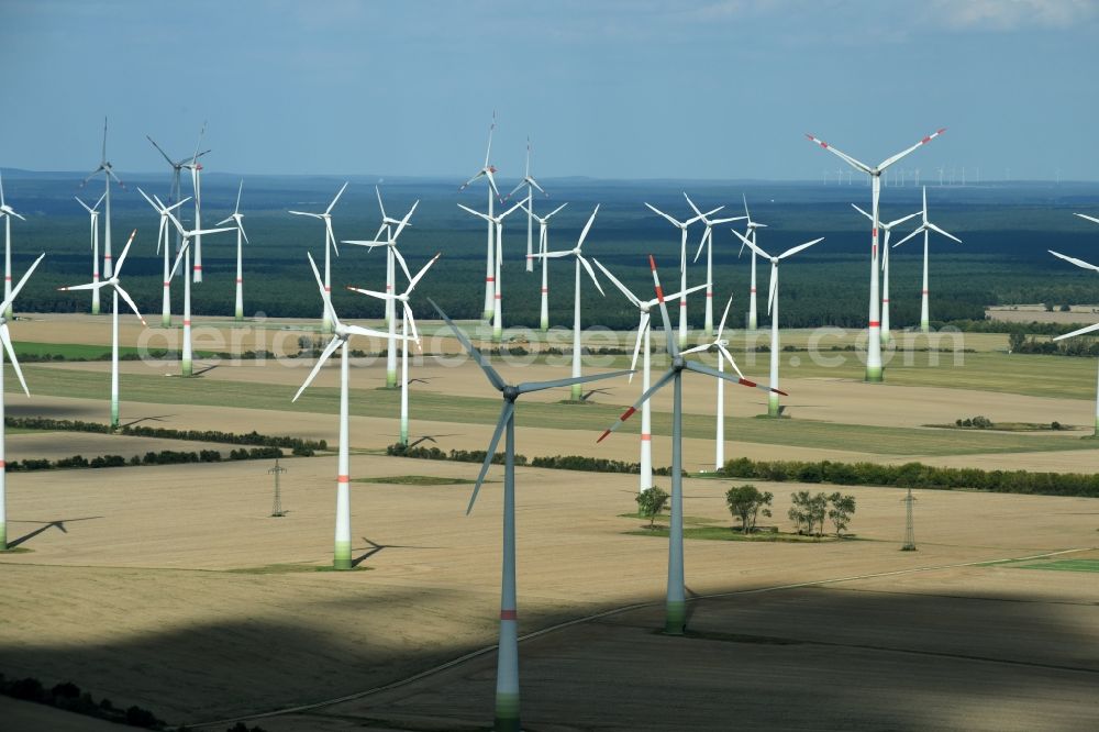 Aerial photograph Treuenbrietzen - Wind turbine windmills on a field in Treuenbrietzen in the state Brandenburg