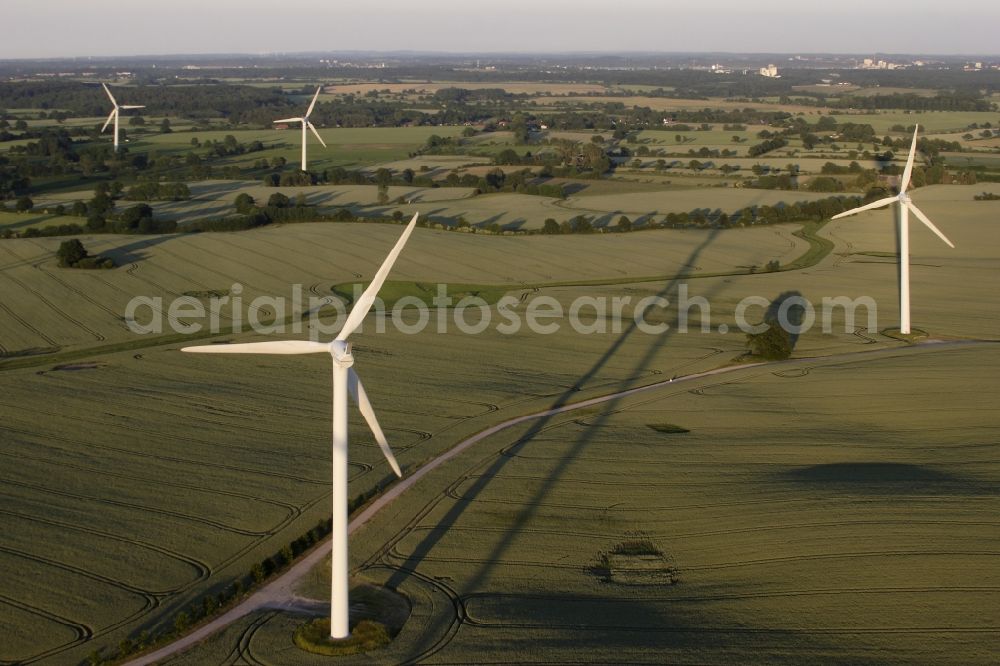 Aerial image Tüttendorf - Wind turbine windmills on a field in Tuettendorf in the state Schleswig-Holstein