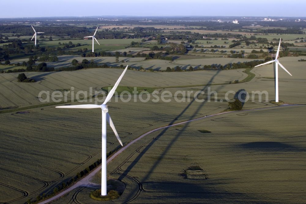 Aerial photograph Tüttendorf - Wind turbine windmills on a field in Tuettendorf in the state Schleswig-Holstein