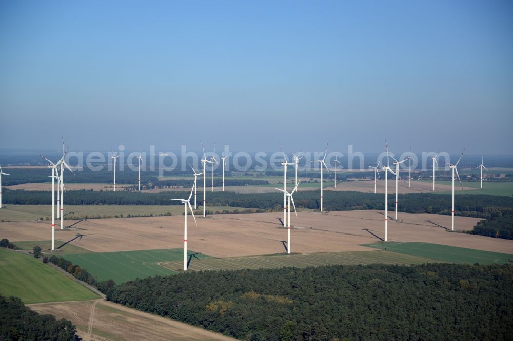 Werneuchen from the bird's eye view: Wind turbine windmills on a field in Werneuchen in the state Brandenburg