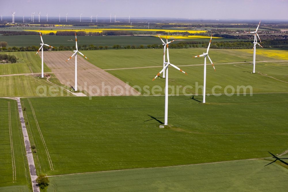 Aerial image Werneuchen - Wind turbine windmills on a field in Werneuchen in the state Brandenburg