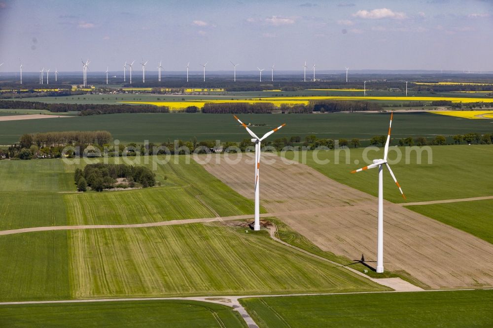 Aerial photograph Werneuchen - Wind turbine windmills on a field in Werneuchen in the state Brandenburg