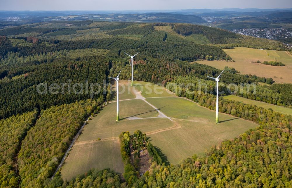 Netphen from above - Wind turbine windmills (WEA) in a forest area in Netphen in the state North Rhine-Westphalia, Germany