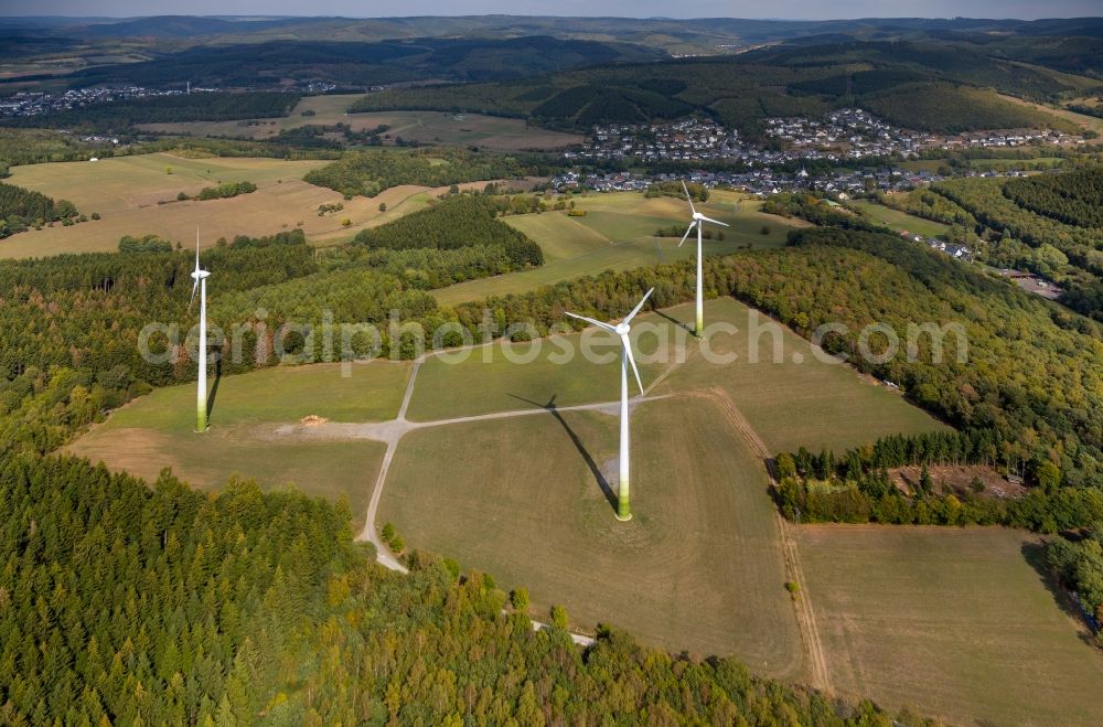 Netphen from the bird's eye view: Wind turbine windmills (WEA) in a forest area in Netphen in the state North Rhine-Westphalia, Germany