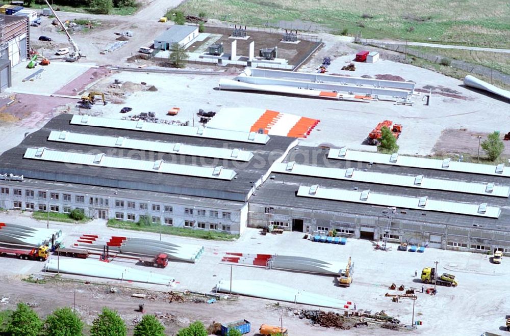 Magdeburg/Sachsen-Anhalt from above - Windenergieanlagenproduktion im Gewerbegebiet am Binnenhafen Magdeburg. ENERCON GmbH Schilfbreite 2 39120 Magdeburg Tel.: (0391) 684700 Ort: Magdeburg/Sachsen-Anhalt Datum: 05.05.03 E-Mail: petra.engelhardt@enercon.de <petra.engelhardt@enercon.de> E-Mail: info@enercon.de ENERCON GmbH Dreekamp 5 D-26605 Aurich Telefon: +49 49 41 927-0