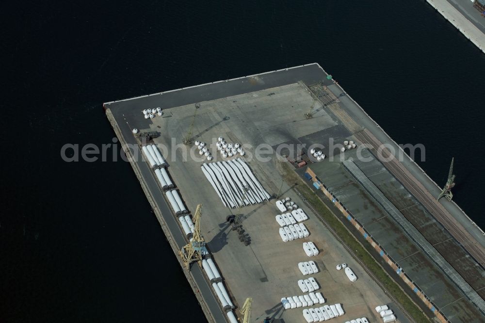 Rostock from the bird's eye view: Wind turbine parts in the port in Rostock in the state Mecklenburg - Western Pomerania