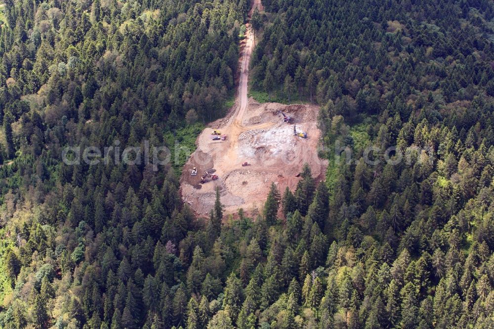 Aerial image Schopfheim - On the Rohrenkopf, the local mountain of Gersbach, a district of Schopfheim in Baden-Wuerttemberg, wind turbines are built. The building areas for the wind turbines have already been cleared in the forest landscape anc construction works for the baseplate have startet