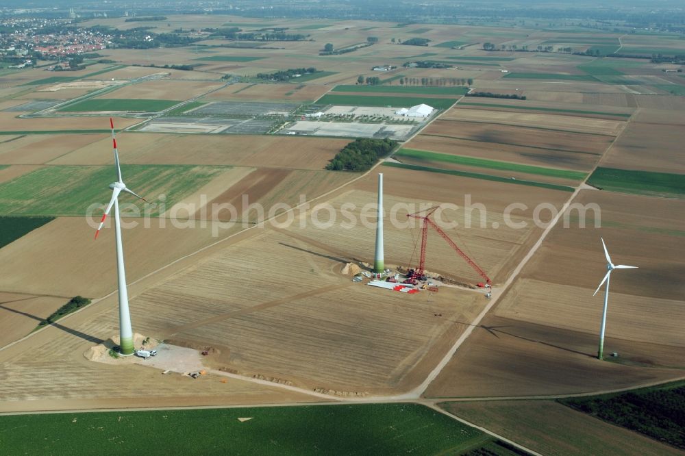 Mainz from above - Wind energy plants in the Ebersheim part of Mainz in Rhineland-Palatinate. The district is the southern-most, highest and youngest part of Mainz. Several wind energy facilities and windmills are being constructed on the fields surrounding Ebersheim