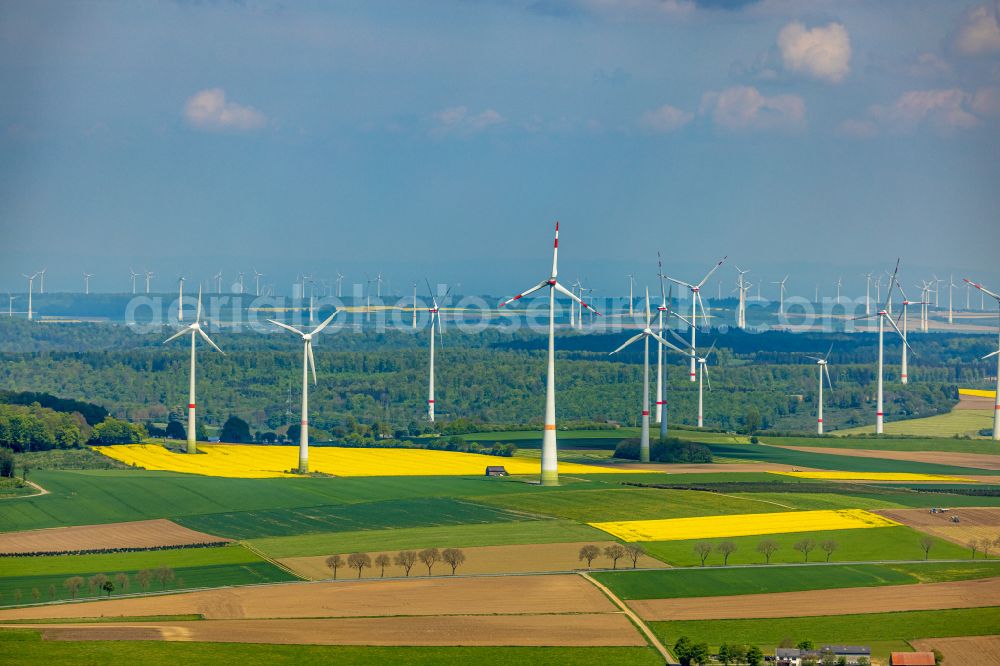 Bad Wünnenberg from the bird's eye view: Agricultural land and fields with wind turbines in Bad Wuennenberg in the state North Rhine-Westphalia, Germany