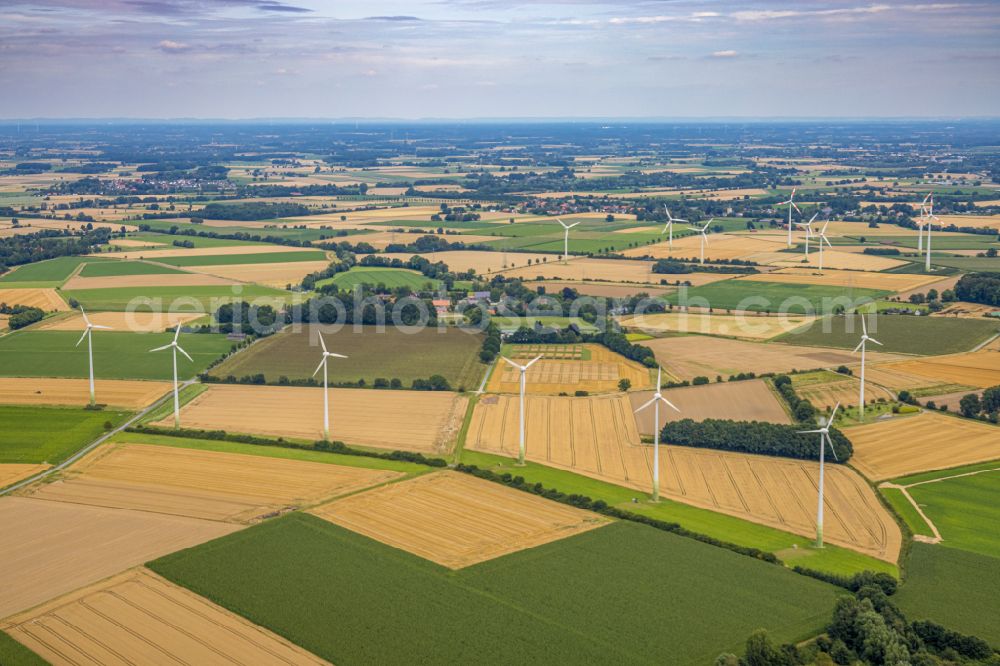 Welver from above - Agricultural land and fields with wind turbines on street K3 in Welver in the state North Rhine-Westphalia, Germany