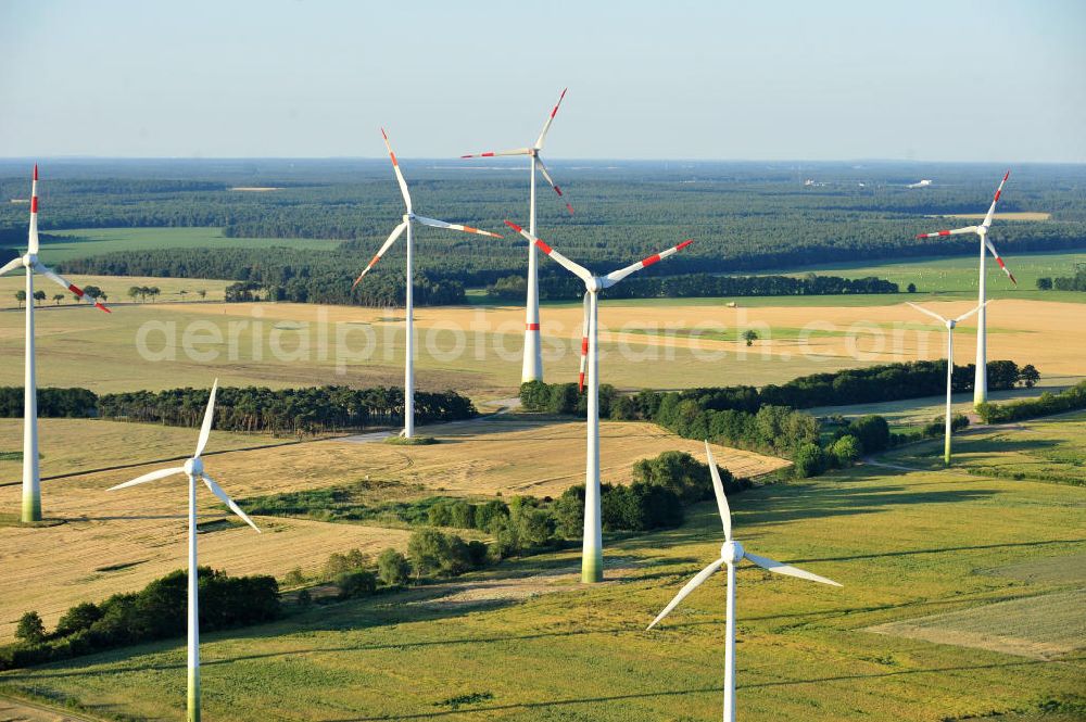 Aerial photograph Woltersdorf - 06/27/2011 WOLTERSDORF view wind turbines of a wind power plant on the harvested fields at Woltersdorf in Saxony-Anhalt