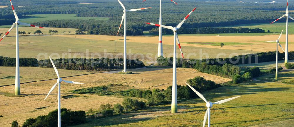 Woltersdorf from above - 06/27/2011 WOLTERSDORF view wind turbines of a wind power plant on the harvested fields at Woltersdorf in Saxony-Anhalt