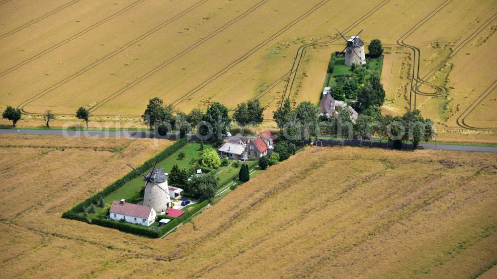 Aerial photograph Ebersroda - Historic windmill on a farm homestead on the edge of cultivated fields in Ebersroda in the state Saxony-Anhalt, Germany