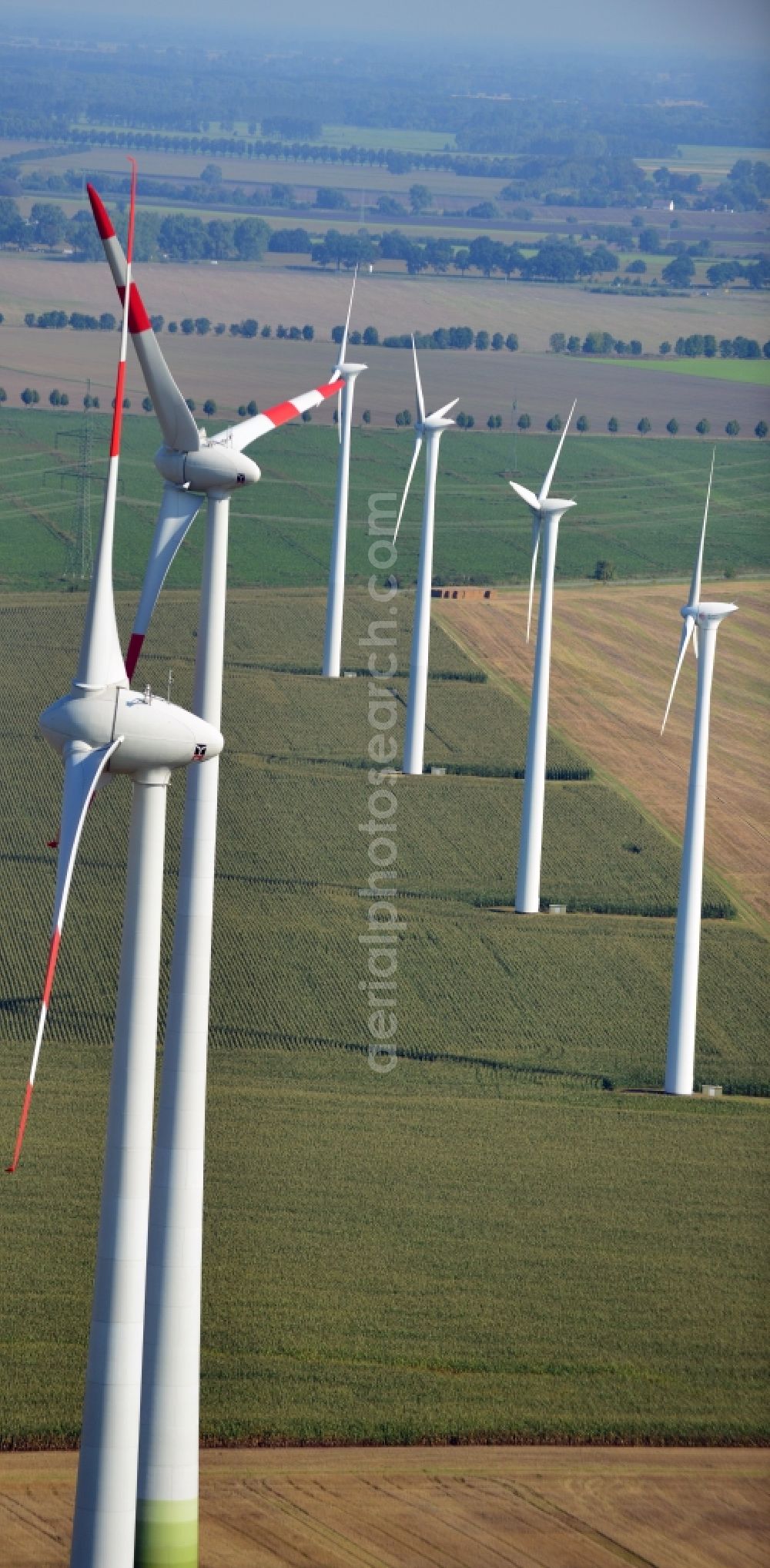 Aerial image Nauen - View of the wind farm Nauen, a wind turbine field to plate the Nauen in Brandenburg