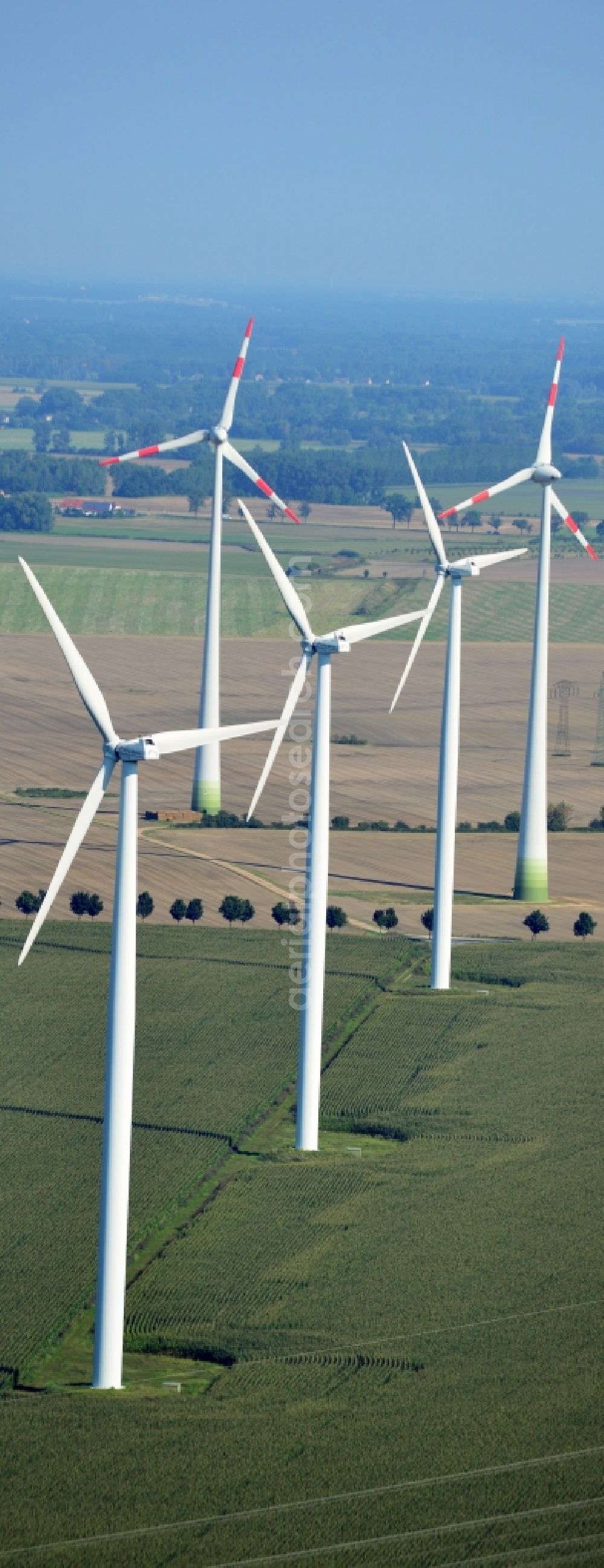 Aerial image Nauen - View of the wind farm Nauen, a wind turbine field to plate the Nauen in Brandenburg