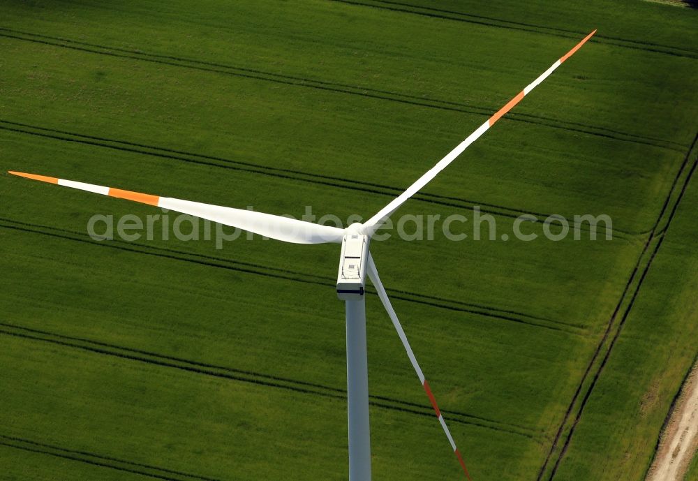 Greußen from the bird's eye view: Wind turbine on a field with alleys in Greussen in the state of Thuringia