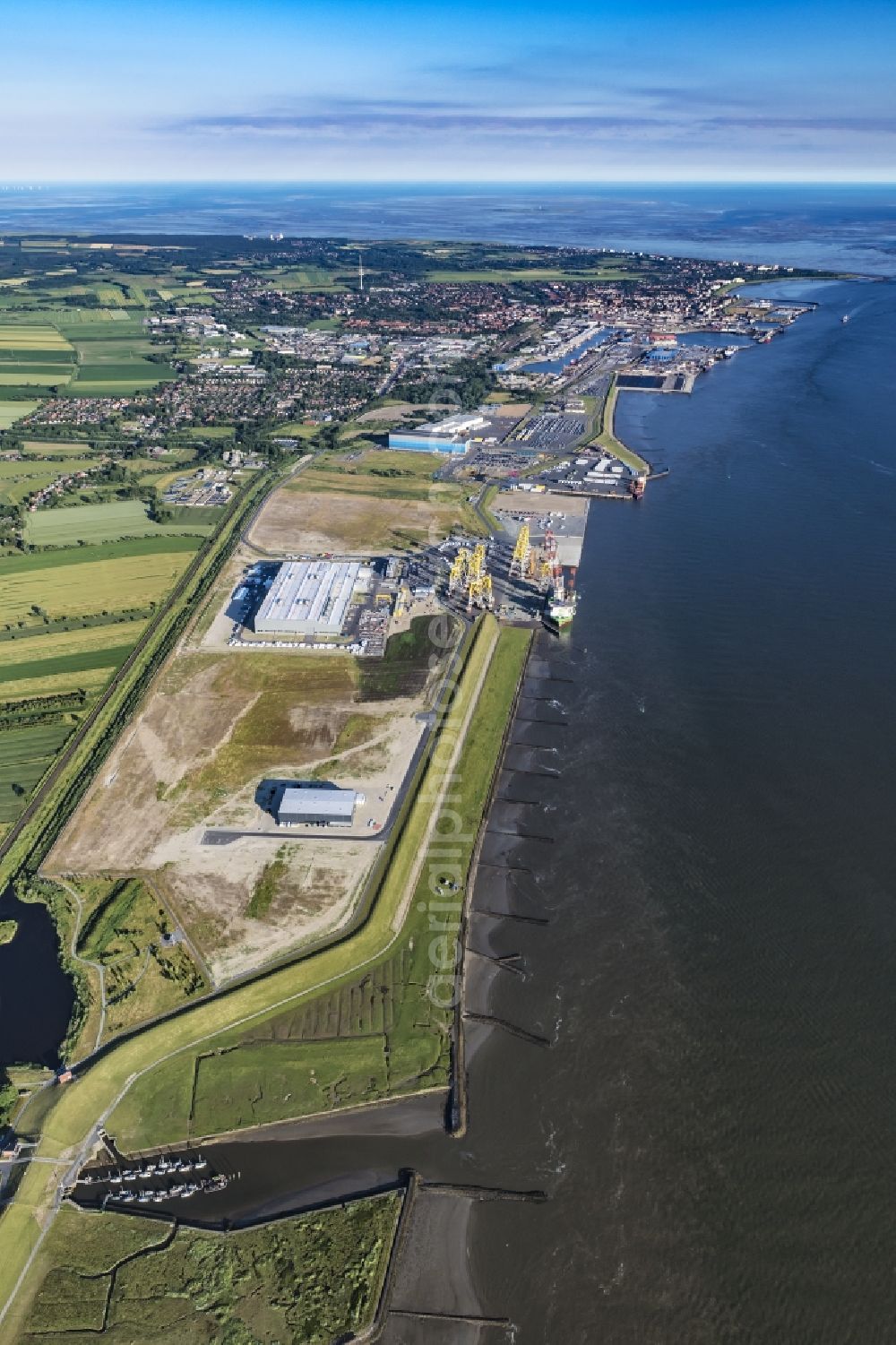 Cuxhaven from above - Wind turbine assembly and manufacturing plant in the industrial area of Siemens Offshore-Windturbinenwerk in Cuxhaven in the state Lower Saxony, Germany