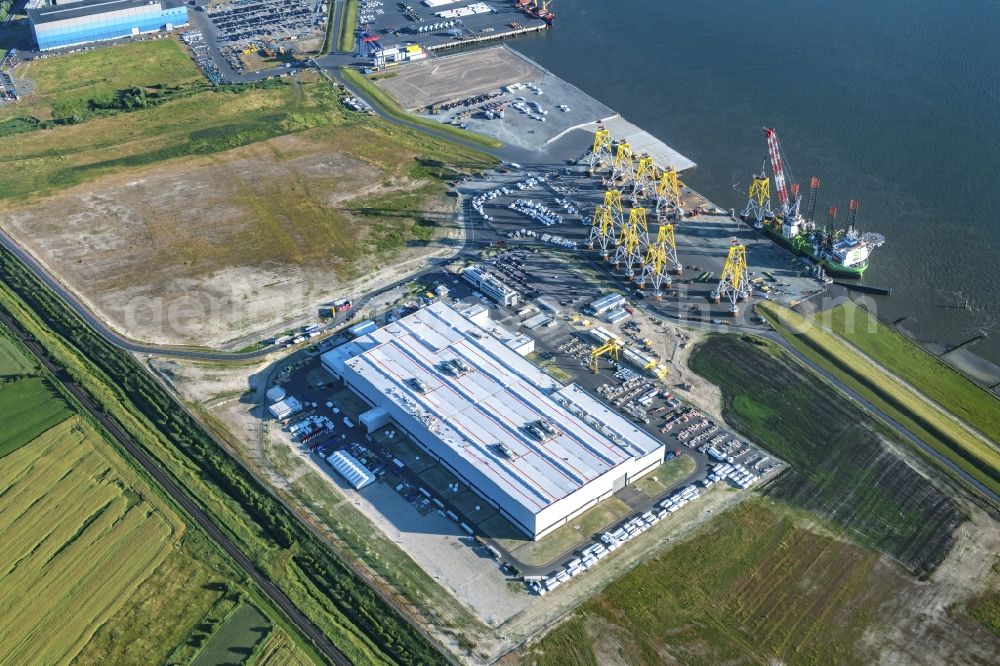 Cuxhaven from the bird's eye view: Wind turbine assembly and manufacturing plant in the industrial area of Siemens Offshore-Windturbinenwerk in Cuxhaven in the state Lower Saxony, Germany