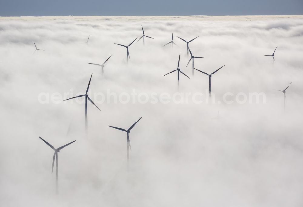 Marsberg from above - Wind turbines projecting from a fog layer and clouds Wind power plant at Marsberg in the Sauerland region in North Rhine-Westphalia