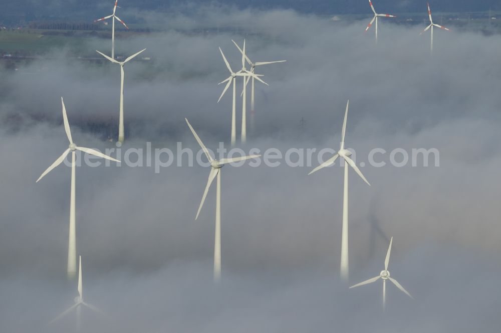 Marsberg from above - Wind turbines projecting from a fog layer and clouds Wind power plant at Marsberg in the Sauerland region in North Rhine-Westphalia