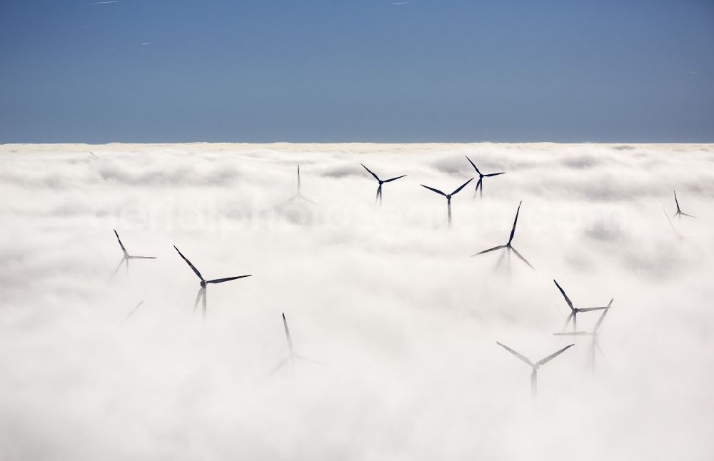 Marsberg from above - Wind turbines projecting from a fog layer and clouds Wind power plant at Marsberg in the Sauerland region in North Rhine-Westphalia