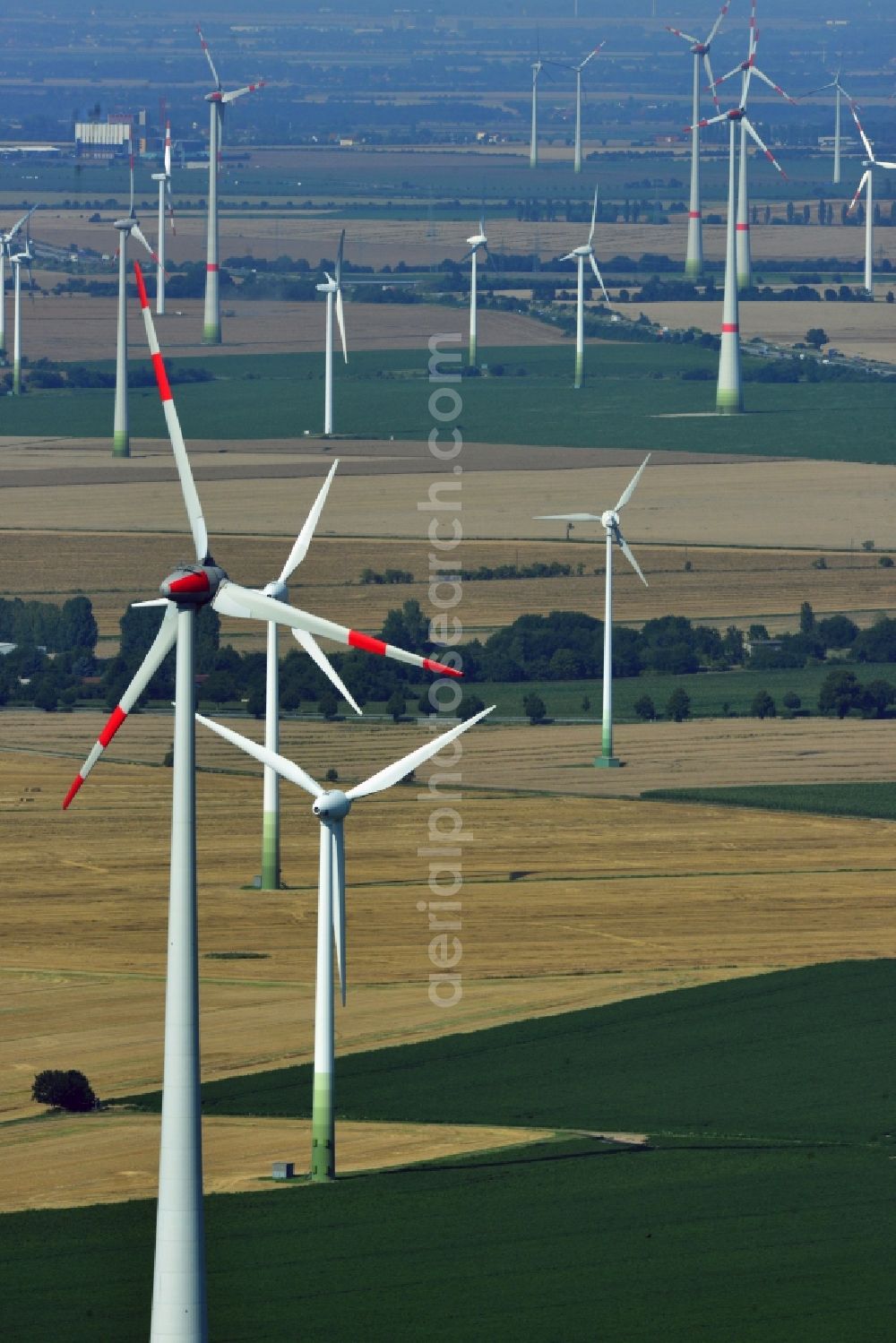 Aerial image Löbitz - Wind turbines of the wind power plants on fields at Loebitz in the state of Saxony-Anhalt