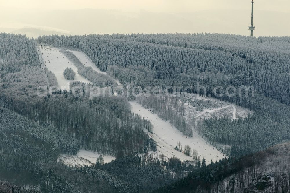 Bödefeld from the bird's eye view: Winter - snow landscape of me Schmallenberg covered the mountain resort Sauerland in North Rhine-Westphalia NRW