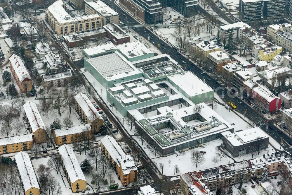 Aerial photograph Essen - Winter - snow-covered landscape of the building of the Folkwang Museum / Museum Folkwang in Essen, North Rhine-Westphalia. The Folkwang Museum displays various exhibitions of painting and sculpture of the 19th Century, classical modernism and art after 1945