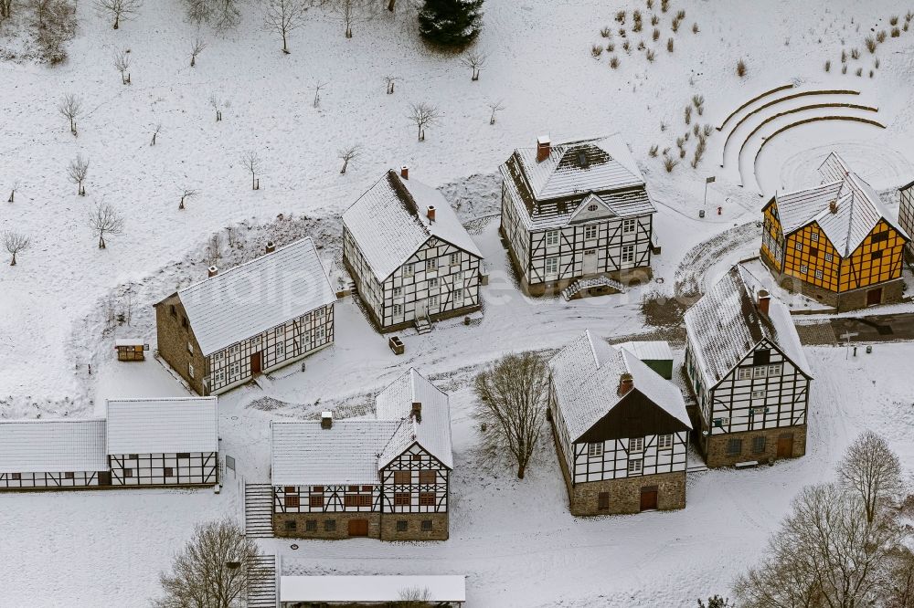 Hagen from above - Winter - landscape of snow-covered terrain of the open-air museum Hagen. The Westphalian State Museum of craft and technology is an open air museum in the Hagen district Selbecke Mäckingerbachtal in the southeastern Ruhr area in North Rhine-Westphalia. Carrier is the Regional Association of Westphalia-Lippe