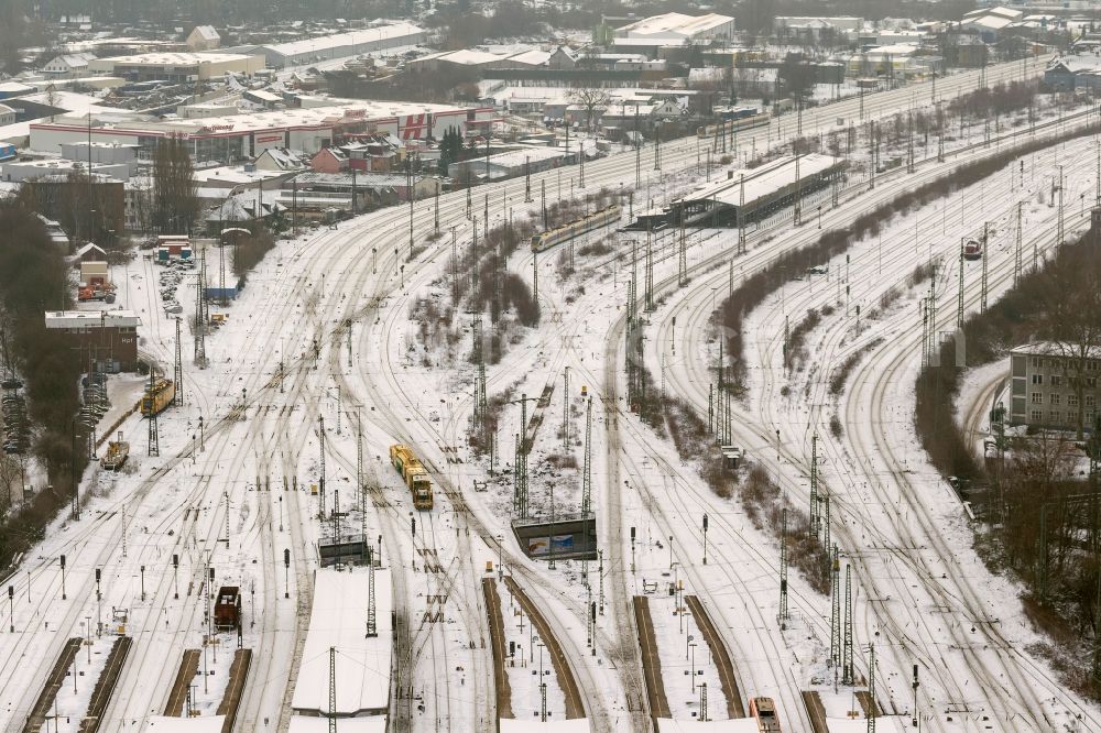 Aerial image Hamm - Winter - landscape of snow-covered tracks of the freight station / yard of Deutsche Bahn in Hamm in North Rhine-Westphalia