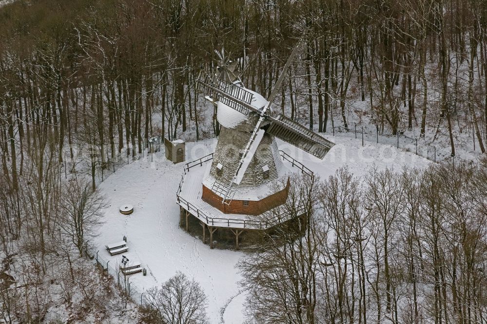 Hagen from the bird's eye view: Winter - landscape of snow-covered terrain of the open-air museum Hagen. The Westphalian State Museum of craft and technology is an open air museum in the Hagen district Selbecke Mäckingerbachtal in the southeastern Ruhr area in North Rhine-Westphalia. Carrier is the Regional Association of Westphalia-Lippe