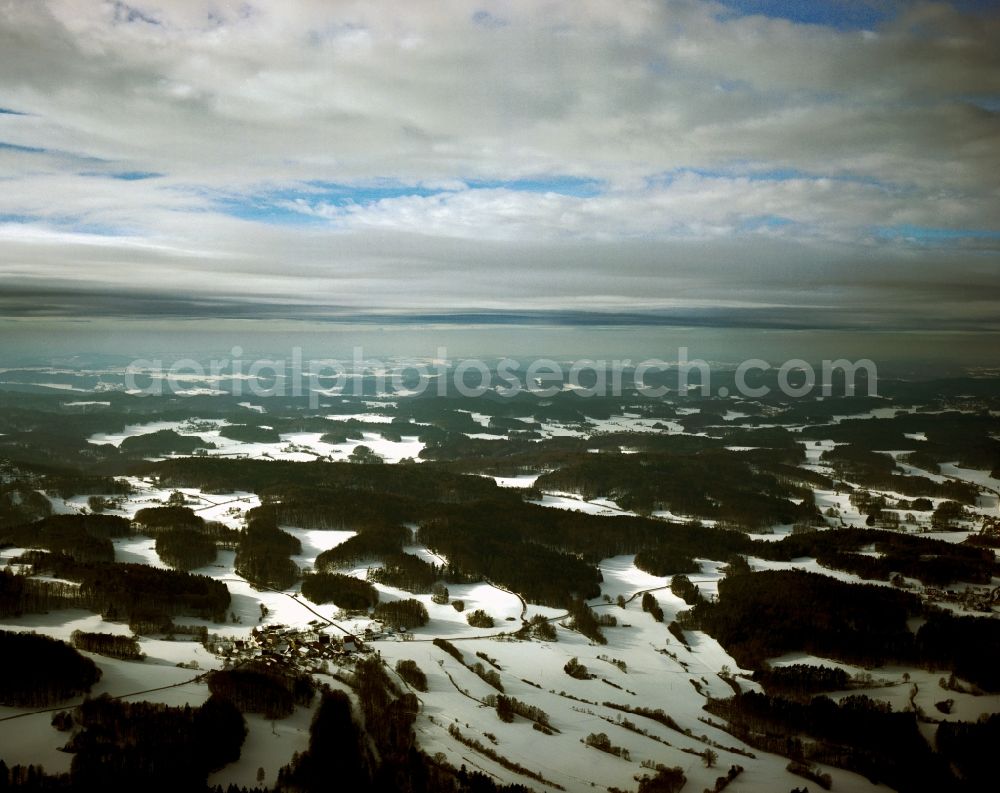 Ebermannstadt from the bird's eye view: Winter - Landscape with fog and snow-covered fields of the Franconian Switzerland near Ebermannstadt in Bavaria