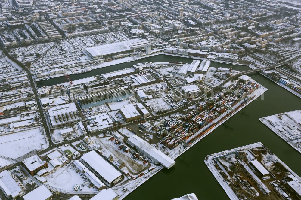 Aerial image Dortmund - Winter - Aerial view of snow-covered terrain of the inland port to the seat of the disposal company Envio in Dortmund in North Rhine-Westphalia. In the largest toxic waste scandal in the country to the recycling company Envio have poisoned over the years employees and residents in Dortmund with carcinogenic PCBs