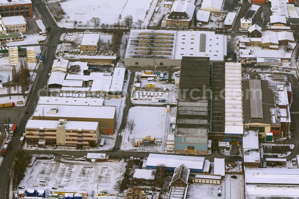 Aerial image Dortmund - Winter - Aerial view of snow-covered terrain of the inland port to the seat of the disposal company Envio in Dortmund in North Rhine-Westphalia. In the largest toxic waste scandal in the country to the recycling company Envio have poisoned over the years employees and residents in Dortmund with carcinogenic PCBs