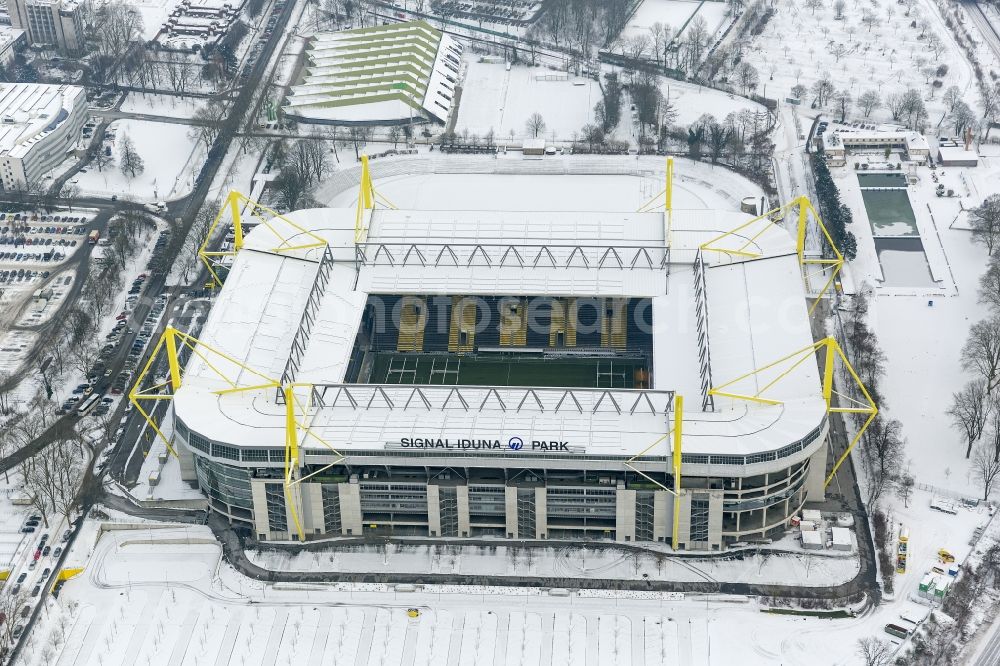 Aerial photograph Dortmund - Winter - Aerial view of snow-covered terrain of Borusseum, the Signal Iduna Park stadium in Dortmund BVB in North Rhine-Westphalia